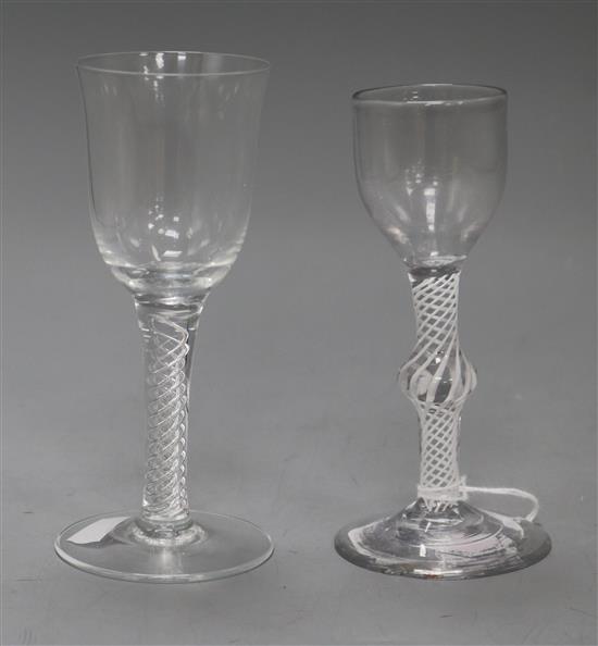 An early 19th century opaque twist cordial glass and a later glass tallest 15cm